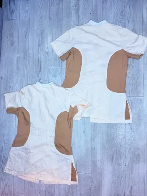 2 Disney cast member house keeping work shirts small and xs one has some marks thumbnail 5