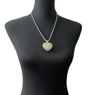 Silver colored heart locket necklace filled with rhinestones in the front side thumbnail 1