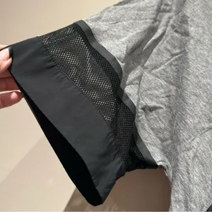 Nike gray top with mesh accents and drawstring bottom hem size XL thumbnail 2