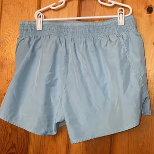Nike Running Dri-FIT Swoosh mid-rise brief-lined shorts in pale blue size medium thumbnail 9