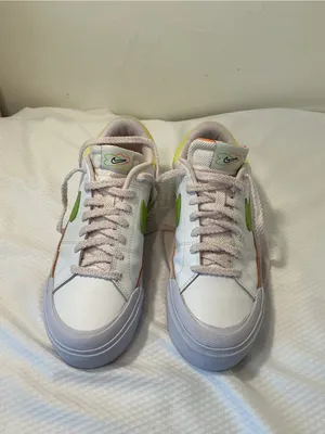 Nike White Low-Top Sneakers with Orange Tongue and Subtle Pink Lining thumbnail 3