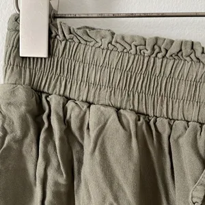 American Eagle olive green wide leg pants in size Medium thumbnail 2