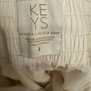 Athleta Alicia Keys Size 8 Keys High Waist Nylon Utility Jogger Cargo Pants thumbnail 12