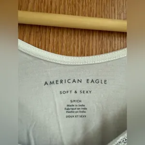 American Eagle Outfitters White Top with Black Embroidery thumbnail 3