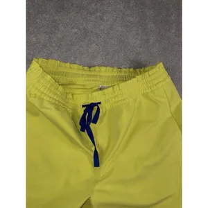 FIGS Marseille Wide Leg Scrub Pants Women Large Petite Neon Yellow thumbnail 4