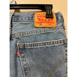 Levis Cutoff Shorts Womens 30 Medium Wash Denim Distressed Raw Hem 90s Concert thumbnail 3