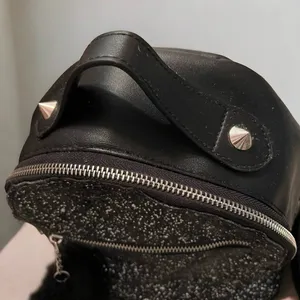Black Glitter Faux Leather Mini Backpack with Pom-Pom Charm & Zippered Pockets thumbnail 7