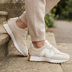 New Balance Beige and White Women's Athletic Sneakers thumbnail 1