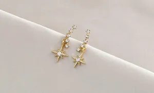 Gold painted earrings thumbnail 1