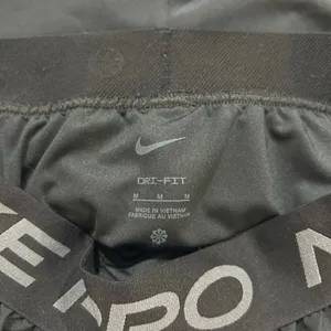 Nike Pro Dri-Fit Running Shorts Black Gray Trim Athletic Women’s Medium thumbnail 5