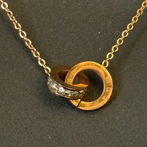 18K gold plated eternity interlocking Roman numeral necklace thumbnail 2