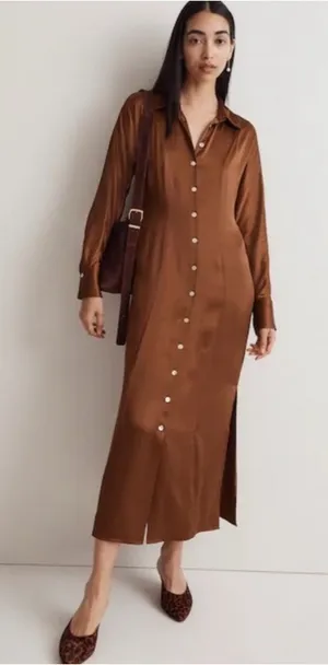 Madewell Satin Button-Front Midi Shirtdress in Cedar Like New Size 00. Satin smooth. Beautiful buttons down the front. No stretch. 50” long 14” bust From the website: Coming in a shiny satin woven with eco-friendly Lenzing™ Ecovero™ viscose fibers, this pretty midi is our modern take on the retro shirtdress. Featuring a point collar, long sleeves and buttons all down the front, it's perfect to pair with tall boots. Body-skimming fit. Length from high point of shoulder: 52" (based on size 6). 57% polyester/43% Lenzing™ Ecovero™ viscose. Do Well: Made of Lenzing™ Ecovero™, a sustainable fabric created with natural fibers and a more eco-friendly process. Machine wash. Imported. Item NO175 thumbnail 1