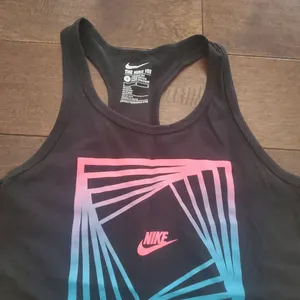 Athletic cut The Nike Tee size Large tank fits on smaller size thumbnail 2