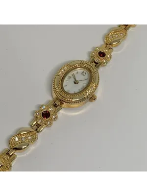 Allude gold tone women’s watch red stones 19mm floral links up to 7.5” running thumbnail 7