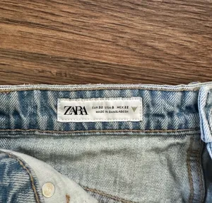 Zara High Waisted Denim Shorts Distressing in a light wash! thumbnail 3
