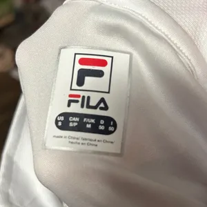 Fila Women’s pickleball quarter-zip pullover. It is a long-sleeve White Small‎ thumbnail 5