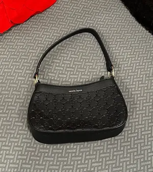 Nanette Lepore black purse with textured pattern thumbnail 1