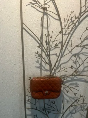 Brown quilted purse with gold hardware thumbnail 3