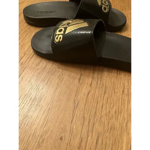 adidas Women’s Black Slide Slip-On Sandals Gold Logo US 9 thumbnail 5