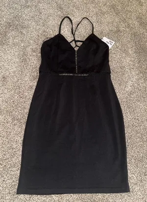 Revolve by the way. Black Strappy Cut-Out Bodycon Mini Dress thumbnail 1