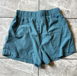 Halara NWOT Womens Teal Blue Active Pleated Shorts Elastic Waist Pockets Size S thumbnail 1