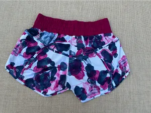 Lululemon Floral Red Burdeos Track That High Rise Running Shorts Zip Pocket Sz 8 thumbnail 3