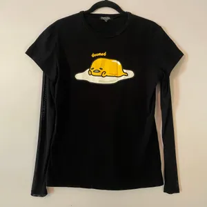 Dolls Kill Hello Kitty Friends Black Doomed Egg Long Sleeve Sheer Sleeve Small thumbnail 1