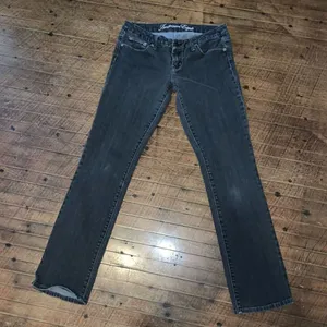 American Eagle distressed washed black 77 Straight 6 jeans thumbnail 1