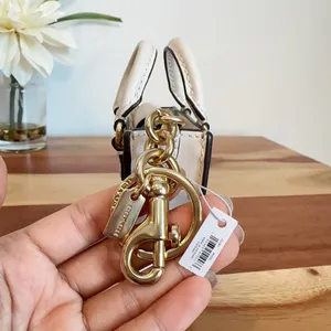 NWT Coach‎ North/South Mini Tote Bag Charm In Signature Canvas thumbnail 3