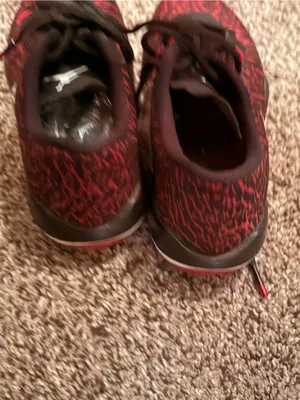 Women’s size 6 Nike Black and Red Low-Top Basketball Sneakers thumbnail 3