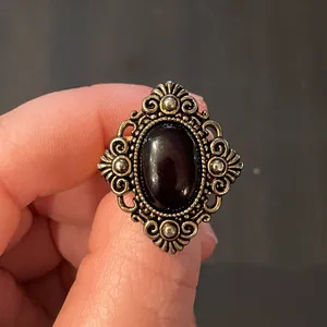Vintage style statement ring. Diamond shaped with black oval center. Adjustable thumbnail 9