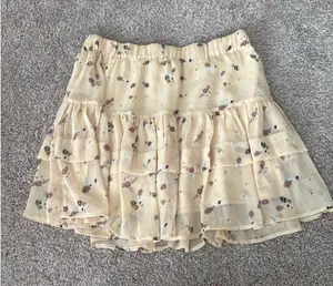 Free People flowy tiered mini skirt thumbnail 1
