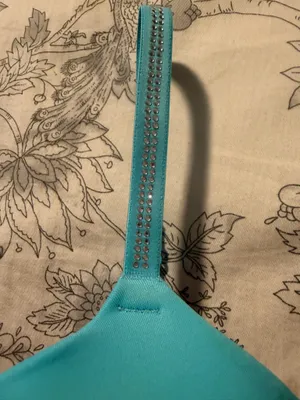 This is a Victoria's Secret blue push-up bra featuring rhinestone-embellished straps. thumbnail 2