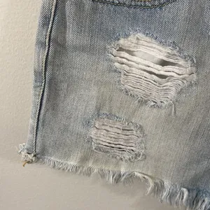 BDG UO Super high rise cheeky denim shorts light wash distressed fringed hem 29 thumbnail 5