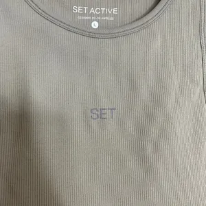 Set Active Sculptflex High Neck Angle Bra Leggings 2-piece Oat Milk Large thumbnail 12