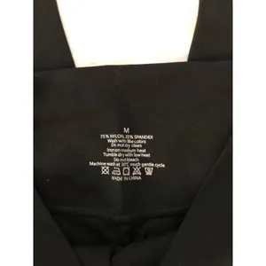 Crossover waist black flare leggings Size M thumbnail 3