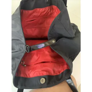 Agnès b. Voyage small black nylon bag with strap details. thumbnail 5