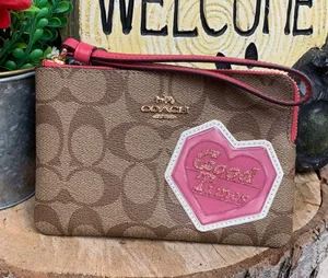 Authentic COACH Signature coated canvas/leather heart( good times) zip wristlet thumbnail 1