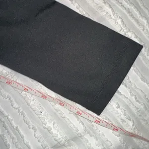Nike Women's Black Leggings with White Logo thumbnail 7