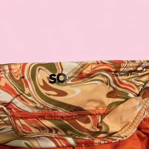 Orange and multi-coloured swirl print shorts with elastic waistband and drawstring thumbnail 3