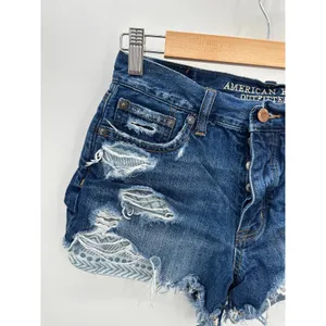 American Eagle Vintage Hi-Rise Festival Blue Distressed Denim Shorts‎ Size 2 thumbnail 4