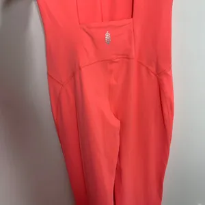 FP Movement Never better Strappy Back Jumpsuit Neon Coral Womens Small thumbnail 7