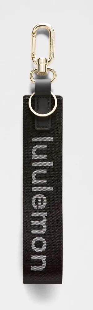 NWT Lululemon Never Lost Keychain in Black/White/Gold thumbnail 1