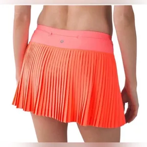 Lululemon Pleat To Street Skirt II- Grapefruit- Size 8 thumbnail 1