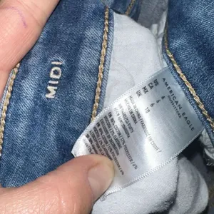 American Eagle distressed denim midi destroyed shorts thumbnail 2