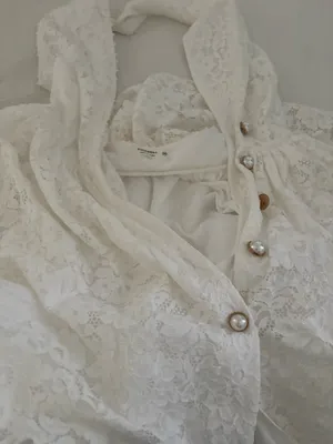 peekskill brand Chic Zimmermann mini dress in cream lace. Features a halter neckline and button details. Ideal for elegant occasions thumbnail 3