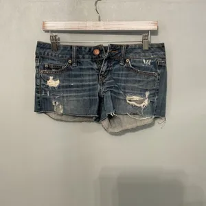 American Eagle Womens Denim Shorts Distressed Raw Hem Blue Size 4 thumbnail 2