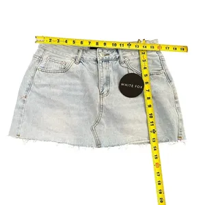 White Fox "Love To Dream" Denim Mini Skirt in a Light Blue Wash size large thumbnail 6