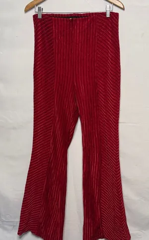 NWOT Free People slim pull on velvet feel flare bottom dark red pants sz Lg thumbnail 1