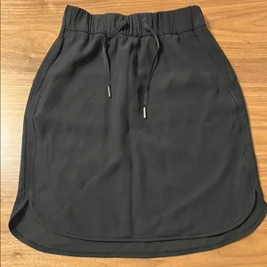 Lululemon On The Fly Woven Skirt Size 4 Cinch Waist Black thumbnail 1